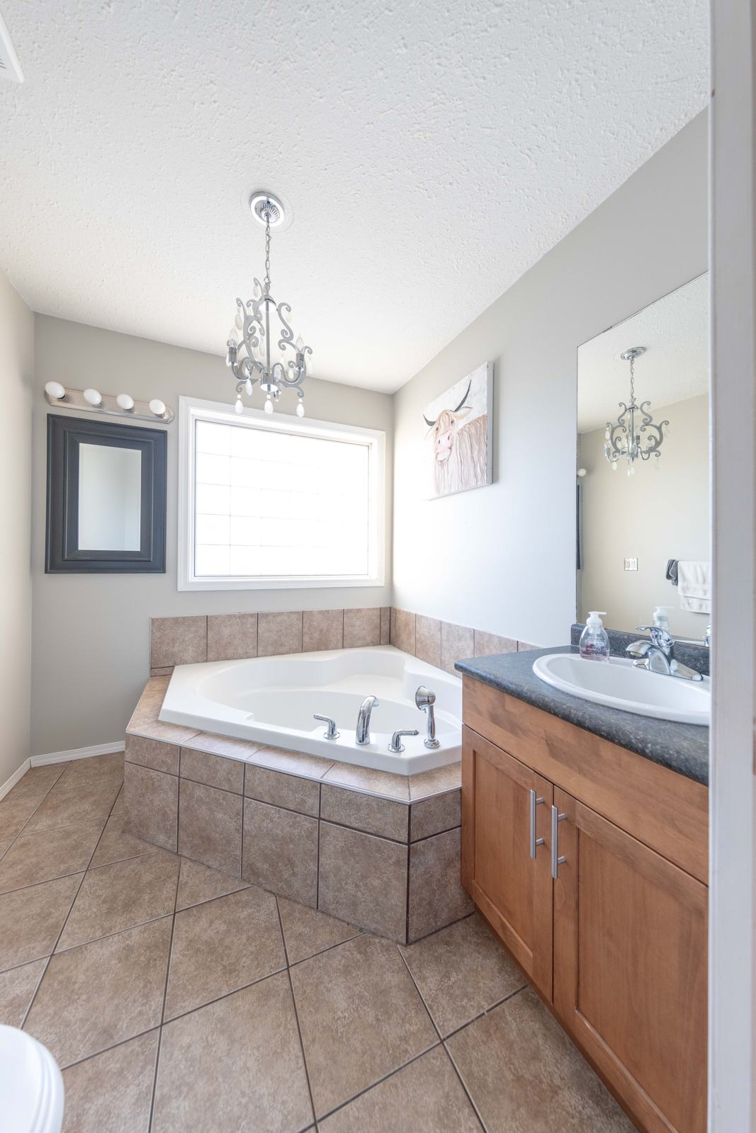 Ensuite with corner soaker tub